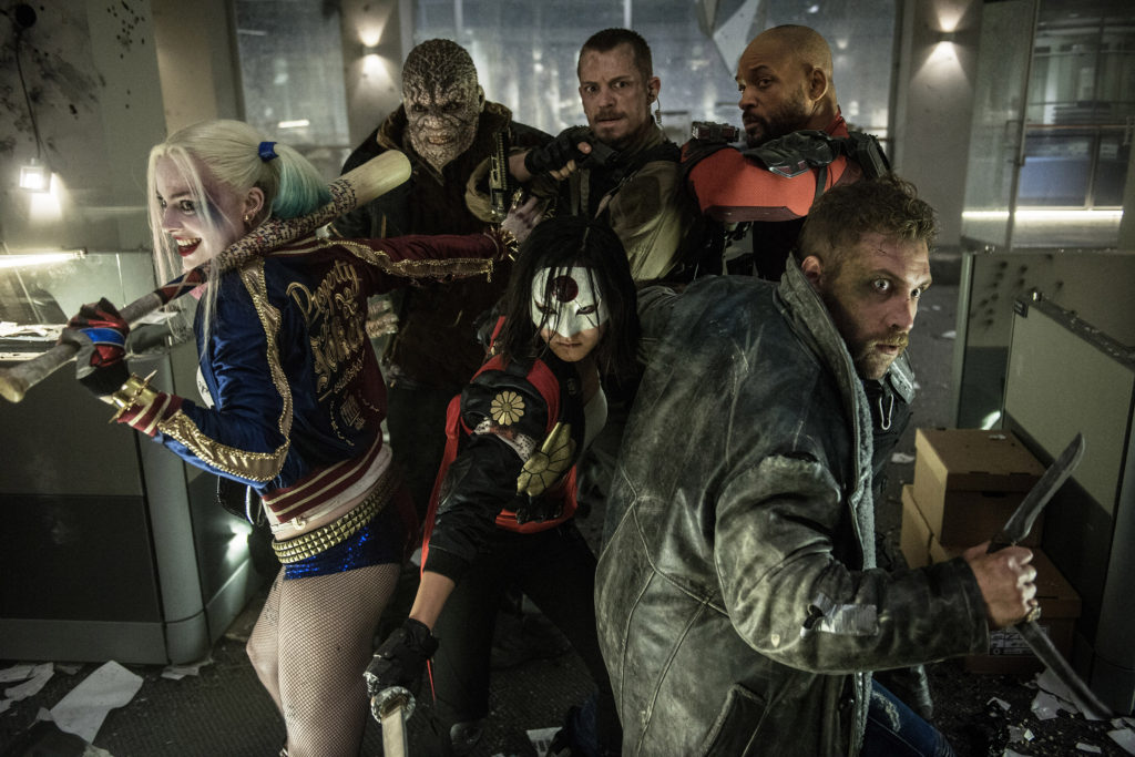 (L-r) MARGOT ROBBIE as Harley Quinn, ADEWALE AKINNUOYE-AGBAJE as Killer Croc, KAREN FUKUHARA as Katana, JOEL KINNAMAN as Rick Flagg, JAI COURTNEY as Boomerang and WILL SMITH as Deadshot in Warner Bros. Pictures' action adventure "SUICIDE SQUAD," a Warner Bros. Pictures release.